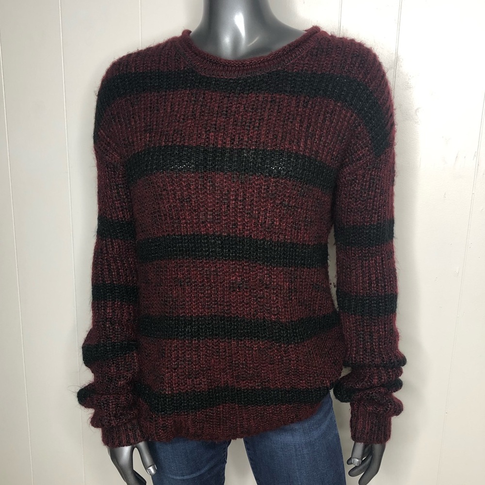 Red and black striped sweater.